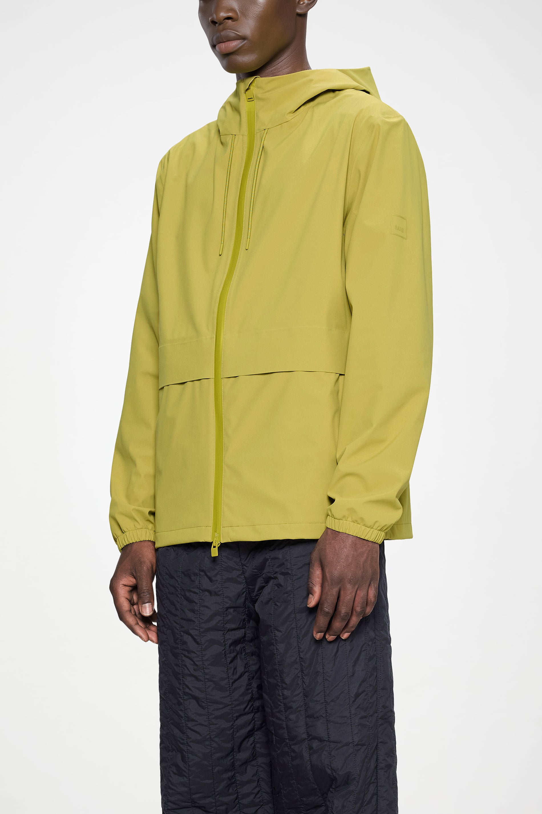 RAINS Suva Hardshell Pocket Jacket Glow Jacket